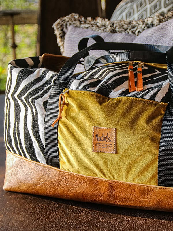African Monarch Lodges Sijwa Boutique Nockels Bag