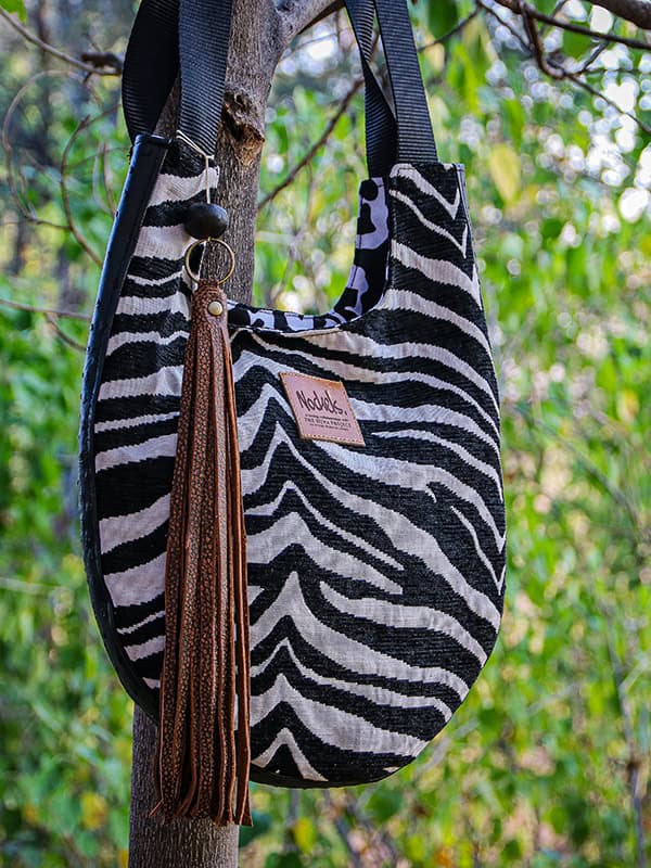 African Monarch Lodges Sijwa Boutique Nockels Bag